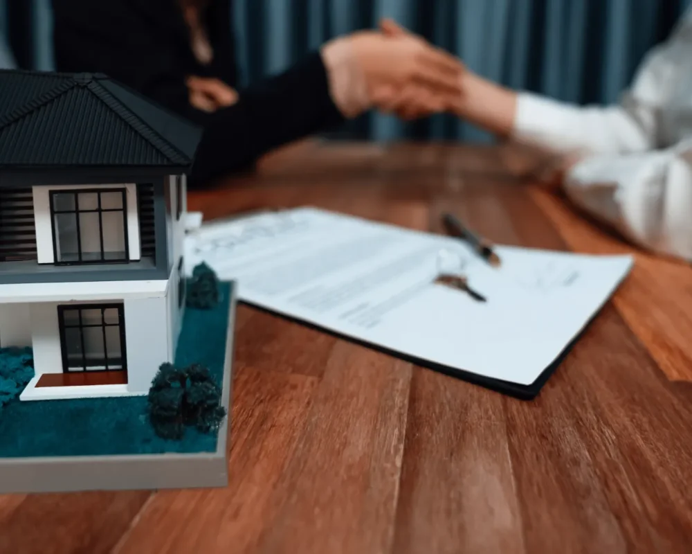 compressed_successful-house-loan-agreement-sealed-with-handshake-enthusiastic